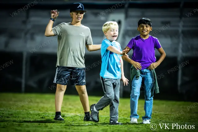 Photo 25 of 34 from 9. Kids Playing Ball, Woodruff vs. Chester · Homecoming